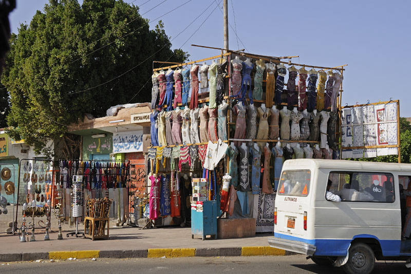 Street scene in Edfu, dress store