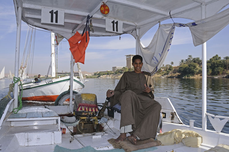 No wind, so this motorboat towed our faluka on the Nile