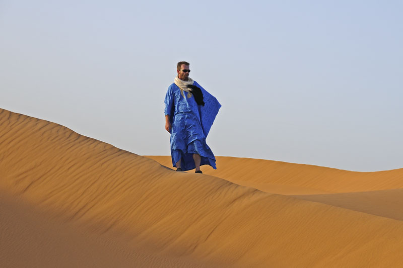 Olivier, our guide, standing on sand dune