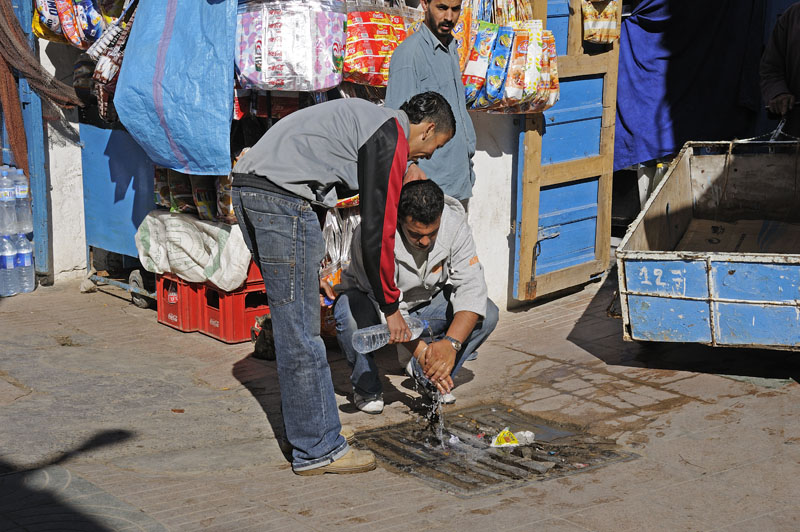 Washing hands in the streets of Essaouira