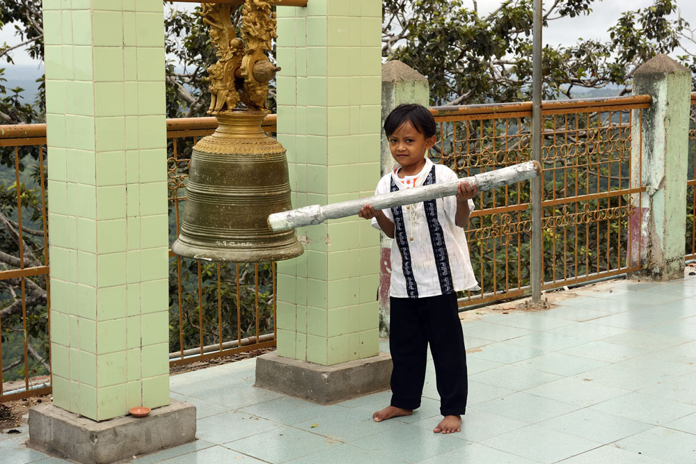 Child ringing bell at the monastery