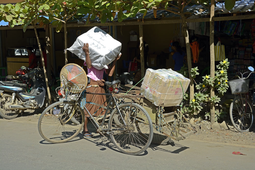 Unloading cargo from bicycle (2 of 4)