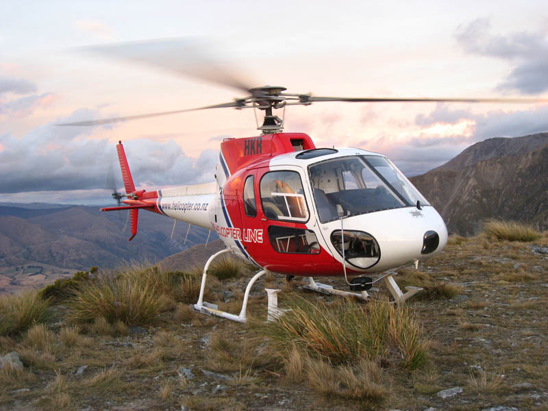 Helicopter on The Remarkables above Queenstown